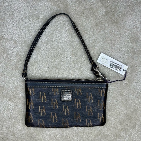Dooney & Bourke Zip Wrist - Picture 1 of 5